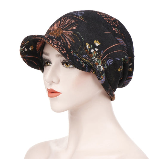 Le foulard casquette ALEXIA pour femme, usage mode ou chimio, noir à motifs élégants, chez Foulard Frenchy